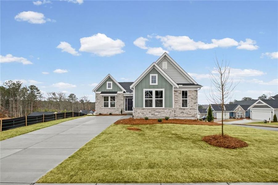 Front exterior of a new home in Easton Park, Dallas, GA, highlighting curb appeal (Image 18). Front exterior of a new home in Easton Park, Dallas, GA, highlighting curb appeal (Image 18).