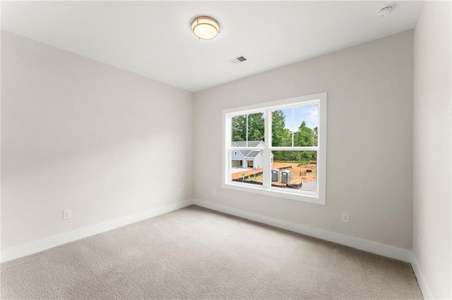 Spacious, unfurnished interior of a new home in Hillgrove Preserve, Powder Springs (Image 52).