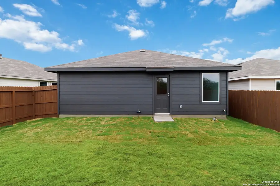 Exterior details and patio area of a home in Avenida, Converse (Image 2). Exterior details and patio area of a home in Avenida, Converse (Image 2).