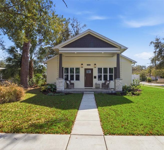 Front exterior of a new home in , St. Petersburg, FL, highlighting curb appeal (Image 28).