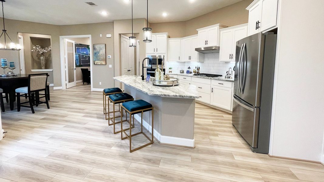 Representative furnished interior of a home built from the Portico by Epcon Communities in Winfrey Estates, Tomball (Image 6). Representative furnished interior of a home built from the Portico by Epcon Communities in Winfrey Estates, Tomball (Image 6).