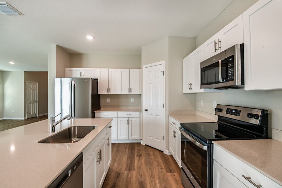 Furnished interior view inside a new home in Crosswinds, Haines City (Image 4).