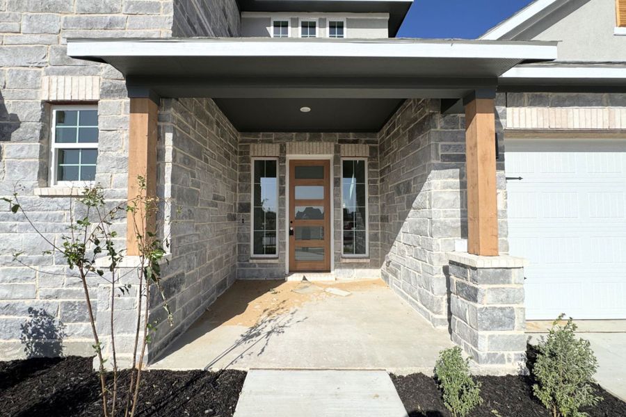 Exterior details and patio area of a home in Wellington, Haslet (Image 3).