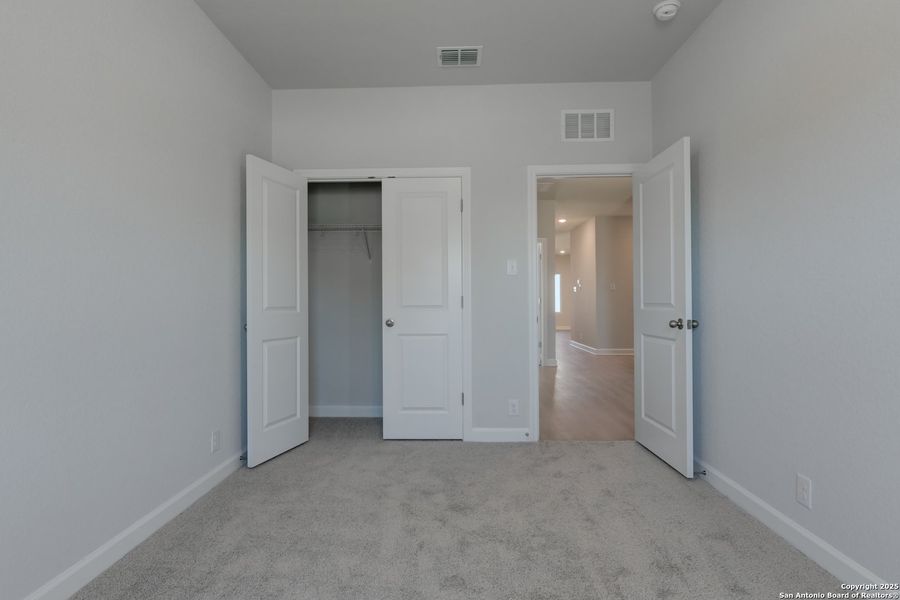 Spacious, unfurnished interior of a new home in Enclave at Hennersby Hollow 50's, San Antonio (Image 17). Spacious, unfurnished interior of a new home in Enclave at Hennersby Hollow 50's, San Antonio (Image 17).