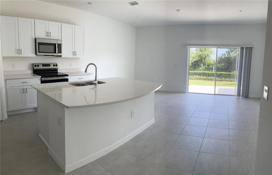 Furnished interior view inside a new home in , St. Cloud (Image 3).