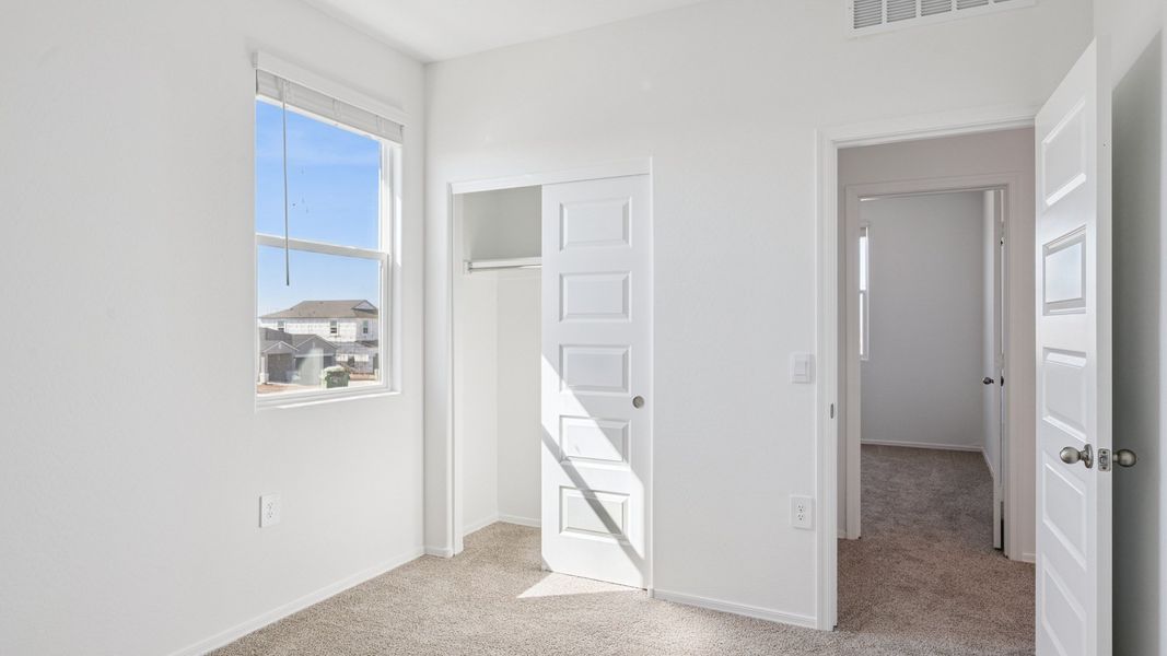 Representative unfurnished interior of a home built from the Ibis by D.R. Horton in Elena Trails, Maricopa (Image 34).