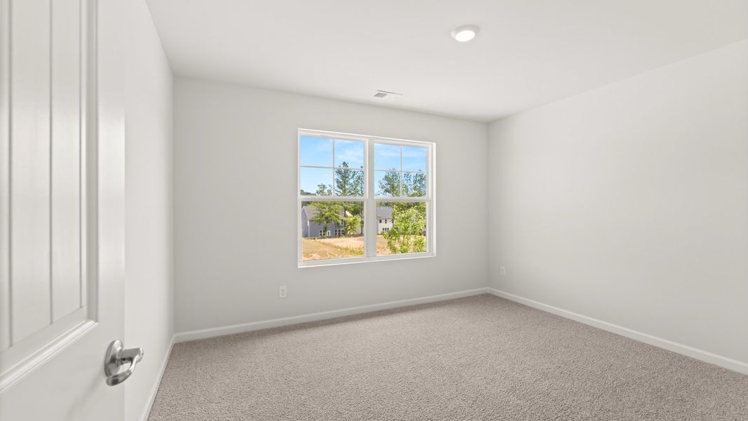 Representative unfurnished interior of a home built from the Green by D.R. Horton in Fairway 17 at Mirror Lake, Villa Rica (Image 42).