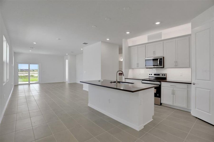 Furnished interior view inside a new home in Turnleaf, Punta Gorda (Image 9).