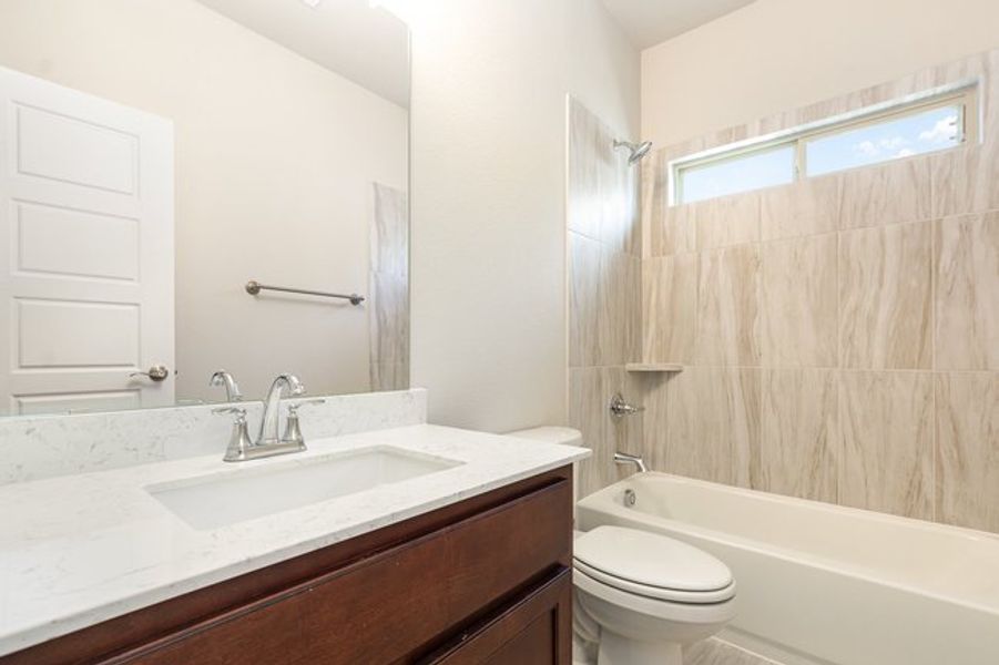 Furnished interior view inside a new home in Courts Of Bonnie Brae, Denton (Image 11).