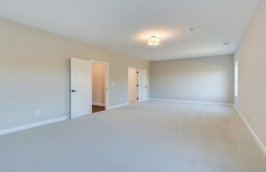 Spacious, unfurnished interior of a new home in Courtyards at Traditions, Cumming (Image 18).