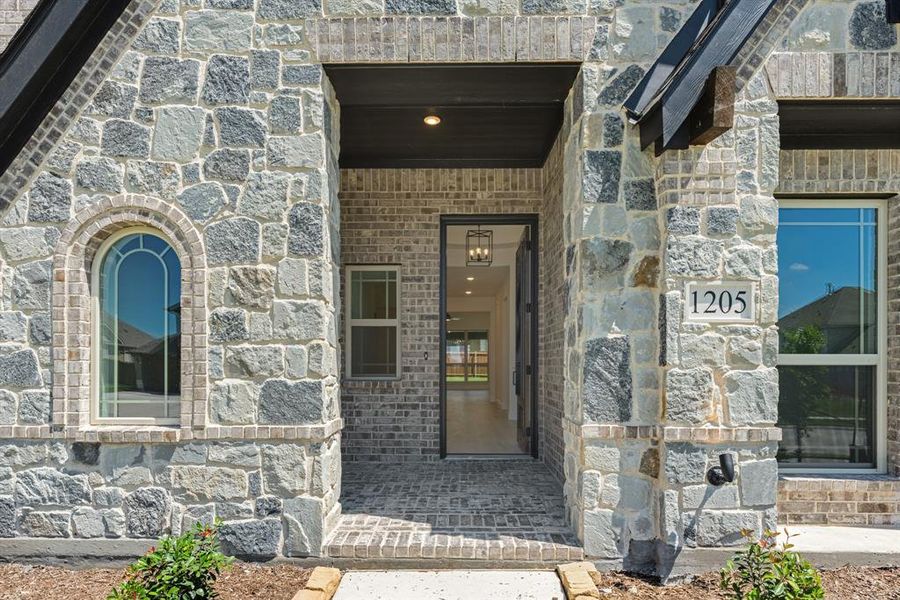 Front exterior of a new home in Trees Farm, DeSoto, TX, highlighting curb appeal (Image 1). Front exterior of a new home in Trees Farm, DeSoto, TX, highlighting curb appeal (Image 1).