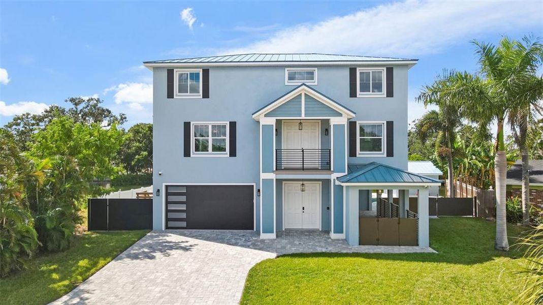 Front exterior of a new home in , Tampa, FL, highlighting curb appeal (Image 1). Front exterior of a new home in , Tampa, FL, highlighting curb appeal (Image 1).