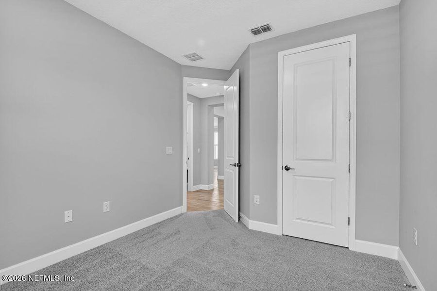 Spacious, unfurnished interior of a new home in Colbert Landings, Palm Coast (Image 33).