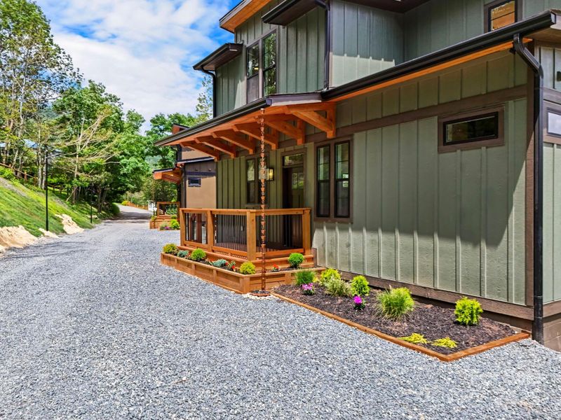 Front exterior of a new home in , Seven Devils, NC, highlighting curb appeal (Image 25). Front exterior of a new home in , Seven Devils, NC, highlighting curb appeal (Image 25).