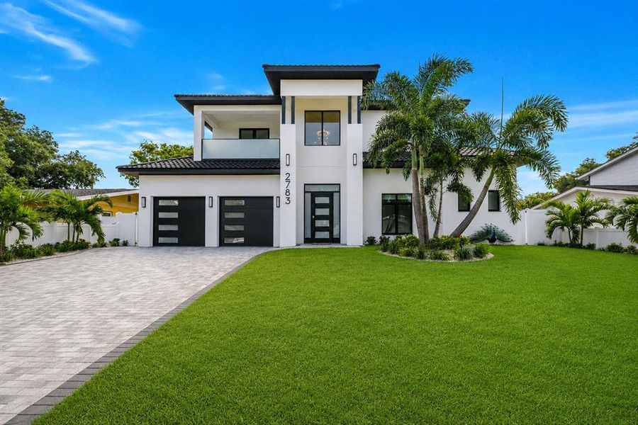 Front exterior of a new home in , St. Petersburg, FL, highlighting curb appeal (Image 25). Front exterior of a new home in , St. Petersburg, FL, highlighting curb appeal (Image 25).