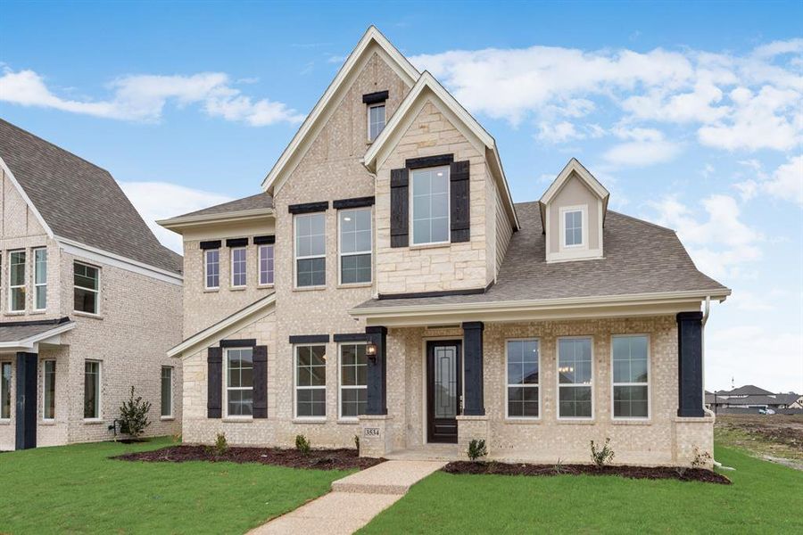 Front exterior of a new home in Prairie Ridge, Midlothian, TX, highlighting curb appeal (Image 17). Front exterior of a new home in Prairie Ridge, Midlothian, TX, highlighting curb appeal (Image 17).