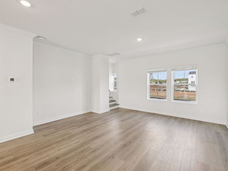 Spacious, unfurnished interior of a new home in Meadows at Wilson Farms - The Heights Series, Fort Mill (Image 12). Spacious, unfurnished interior of a new home in Meadows at Wilson Farms - The Heights Series, Fort Mill (Image 12).