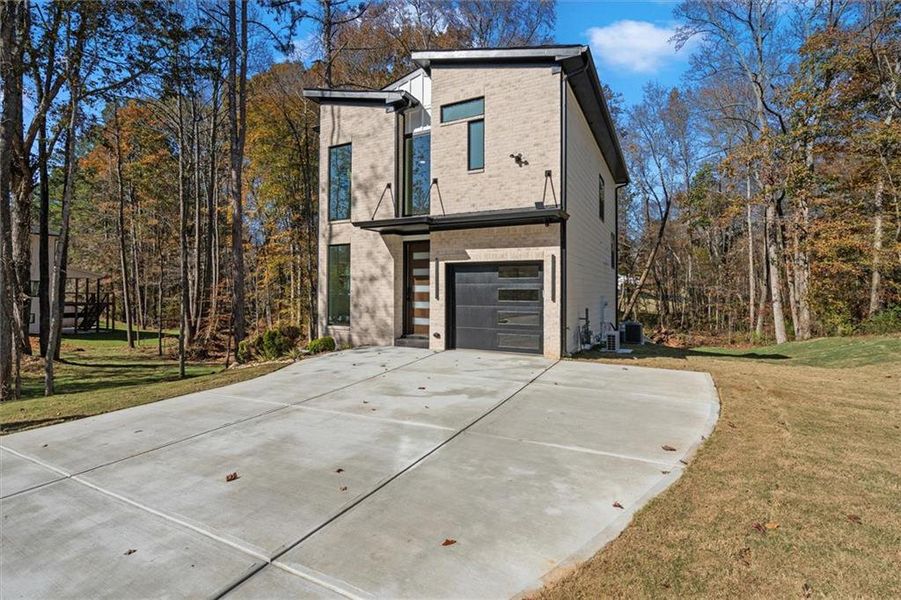 Front exterior of a new home in , Villa Rica, GA, highlighting curb appeal (Image 27).