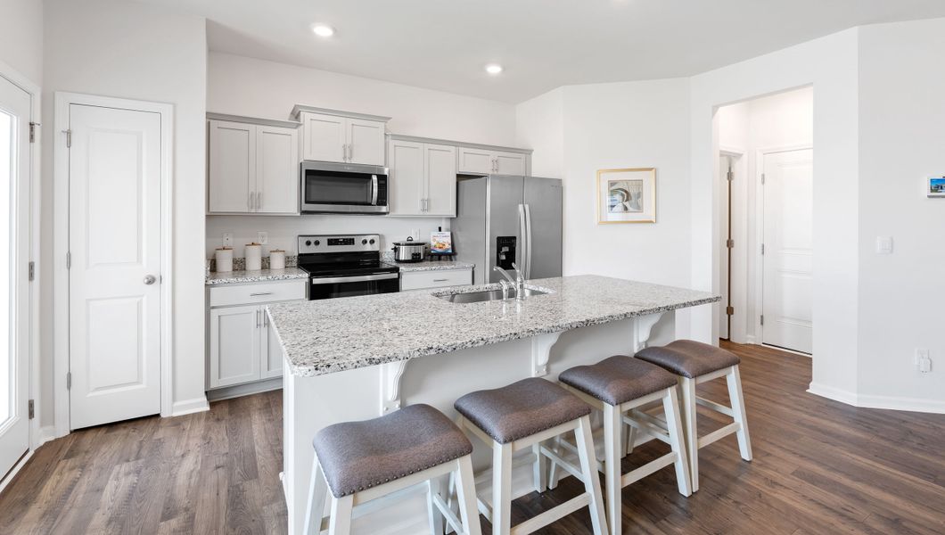 Furnished interior view inside a new home in Tanglewood Townes, Greenville (Image 9).