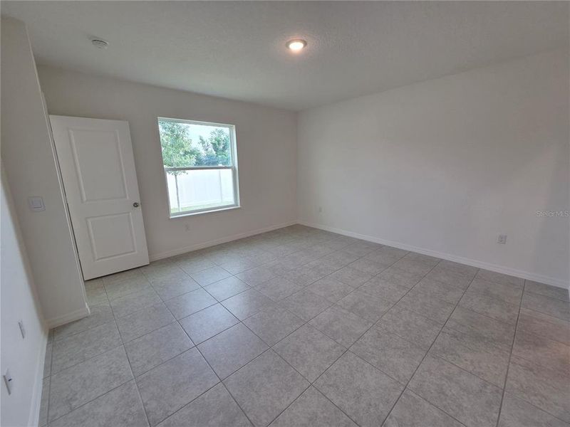 Spacious, unfurnished interior of a new home in Hammock Reserve, Haines City (Image 26). Spacious, unfurnished interior of a new home in Hammock Reserve, Haines City (Image 26).