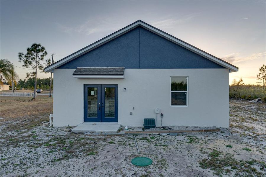 Exterior details and patio area of a home in , Indian Lake Estates (Image 17).