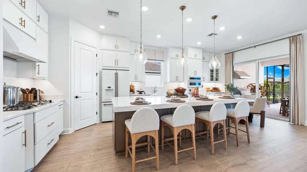Furnished interior view inside a new home in Esplanade by the Islands, Naples (Image 5).
