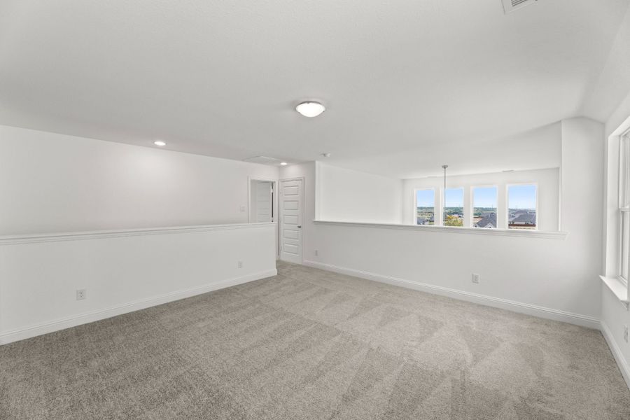 Representative unfurnished interior of a home built from the The Tucker by UnionMain Homes in Reunion, Rhome (Image 19).