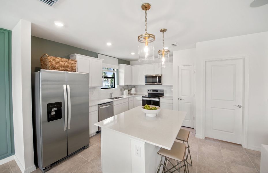Furnished interior view inside a new home in Caloosa Cove, Labelle (Image 7).
