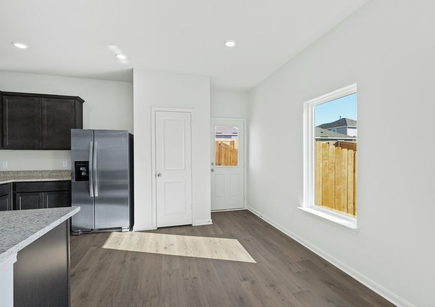 The dining area sits adjacent to the kitchen.