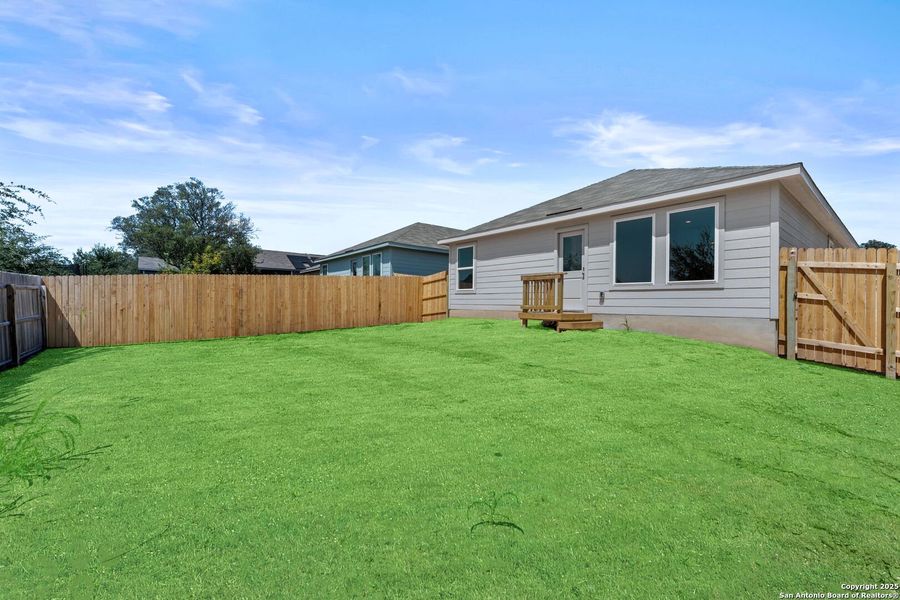 Front exterior of a new home in Waterwheel: Cottage Collection, San Antonio, TX, highlighting curb appeal (Image 2). Front exterior of a new home in Waterwheel: Cottage Collection, San Antonio, TX, highlighting curb appeal (Image 2).