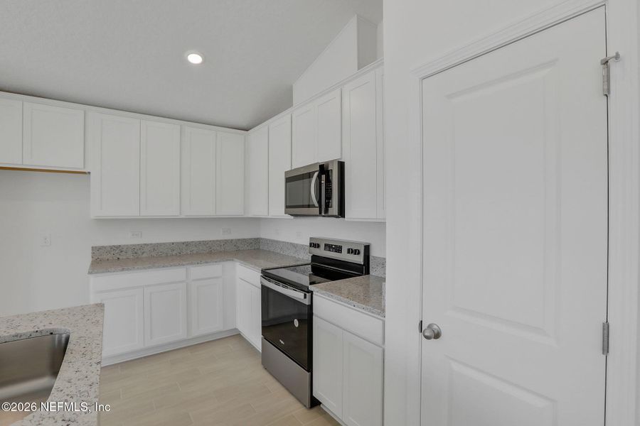 Furnished interior view inside a new home in Bellbrooke, Jacksonville (Image 9).