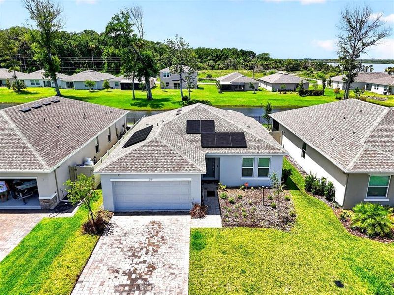 Front exterior of a new home in , Edgewater, FL, highlighting curb appeal (Image 22). Front exterior of a new home in , Edgewater, FL, highlighting curb appeal (Image 22).