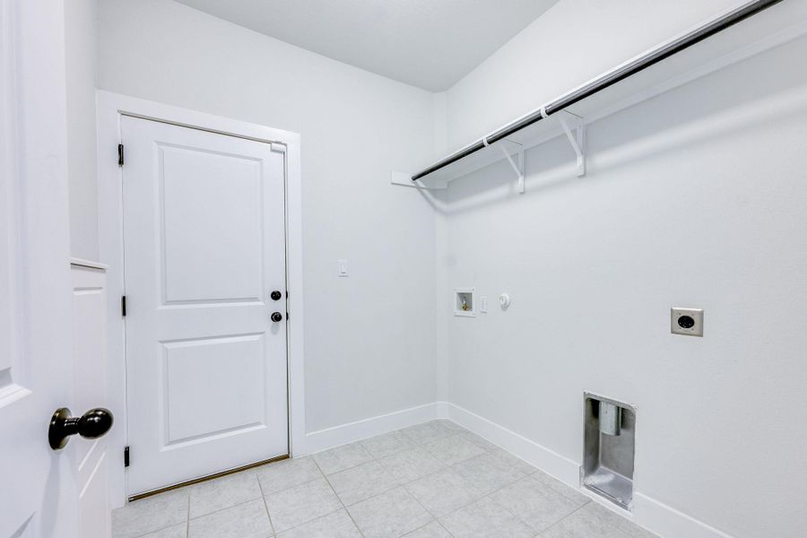 Laundry room featuring gas dryer hookup, electric dryer hookup, and hookup for a washing machine