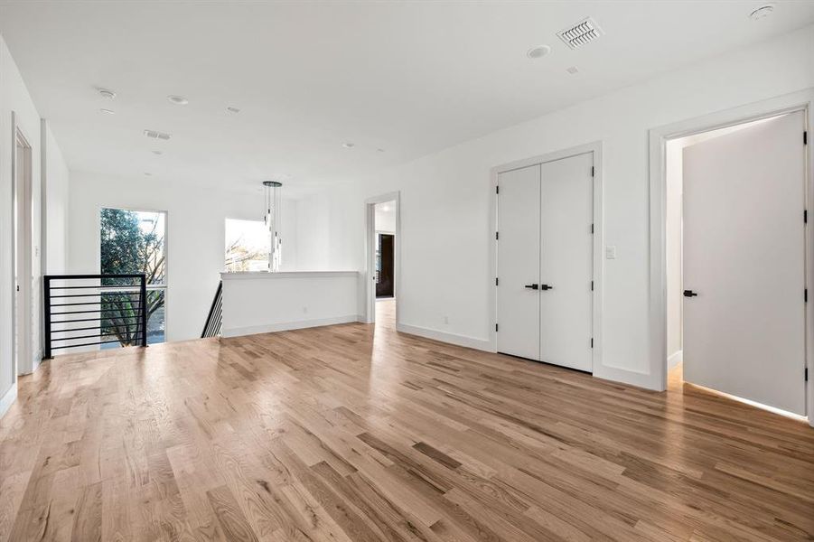 Spare room with light hardwood / wood-style flooring