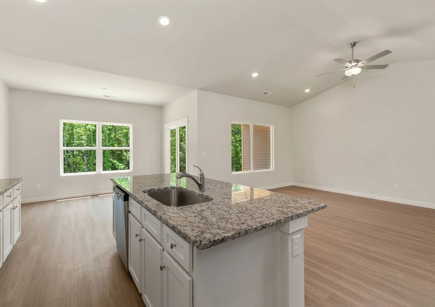 The kitchen overlooks the living area