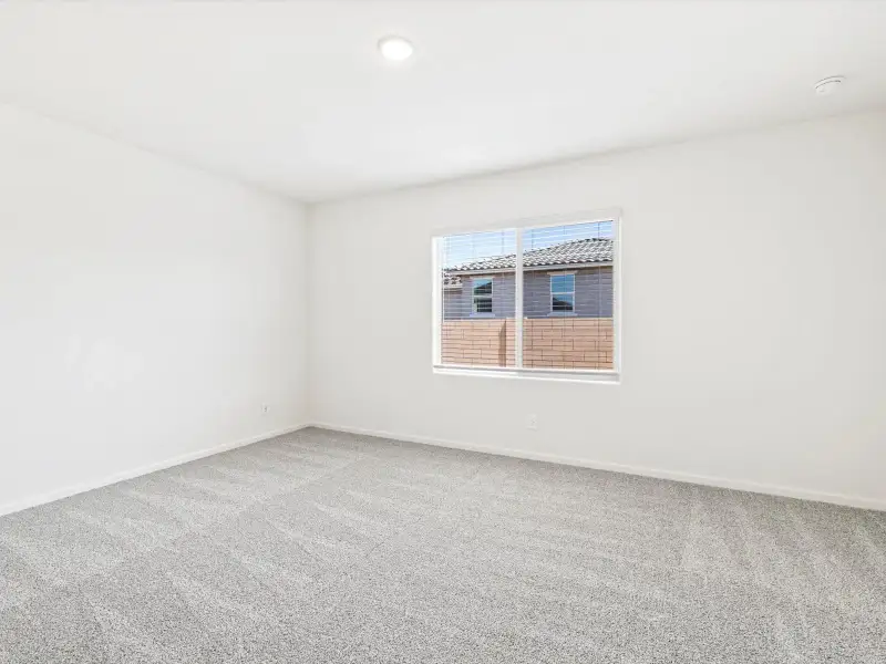 Spacious, unfurnished interior of a new home in Mandarina - Signature Series, Marana (Image 10).