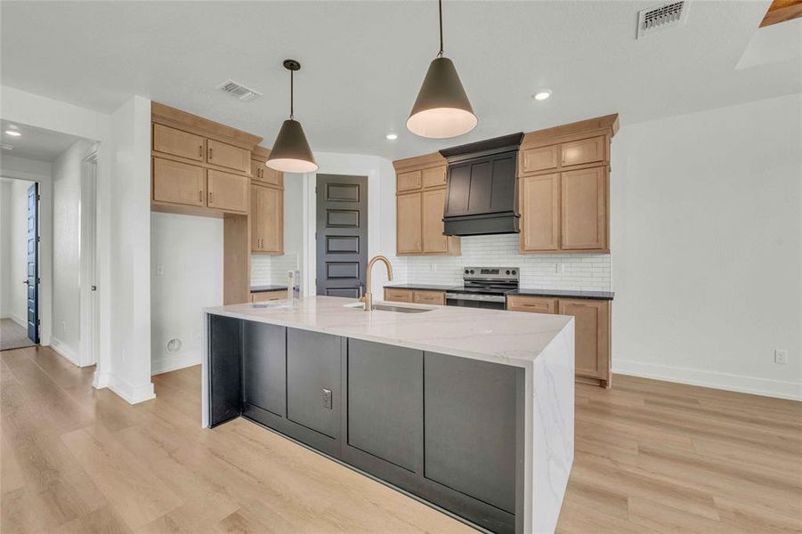 Please Note: These interior photos are not of the actual home but are of a completed one with a similar floor plan. Finishes, features, and layouts may vary.