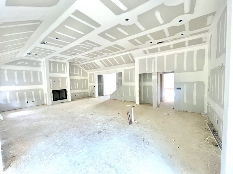 Looking back towards from of the house showing foyer with hardwood stairs Looking back towards from of the house showing foyer with hardwood stairs