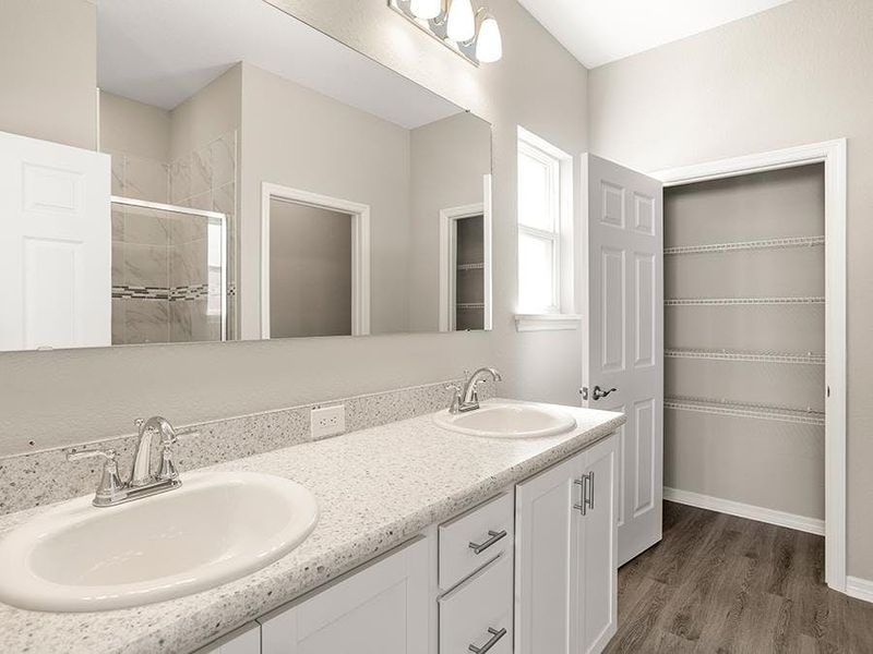 Your suite is complete with an en-suite bath with a tiled shower and the option to add a freestanding tub - Savannah by Highland Homes