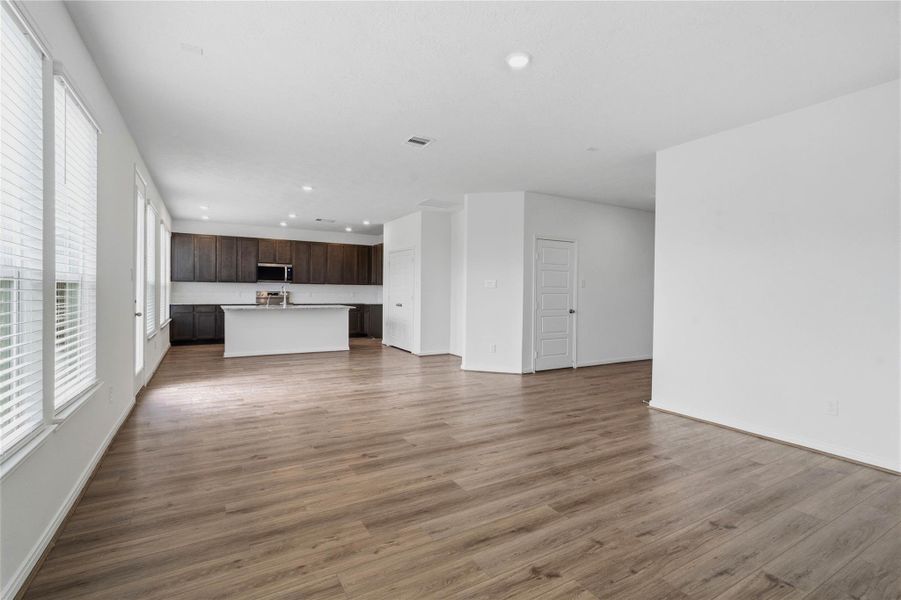 An entertainer’s dream! The expansive, open-concept main floor flows beautifully from room to room, keeping you connected to guests whether you're cooking in the kitchen or relaxing in the living room.