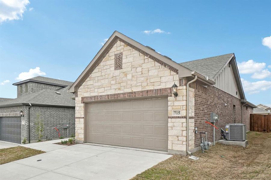 Front exterior of a new home in Eastridge - Spring Series, McKinney, TX, highlighting curb appeal (Image 21).