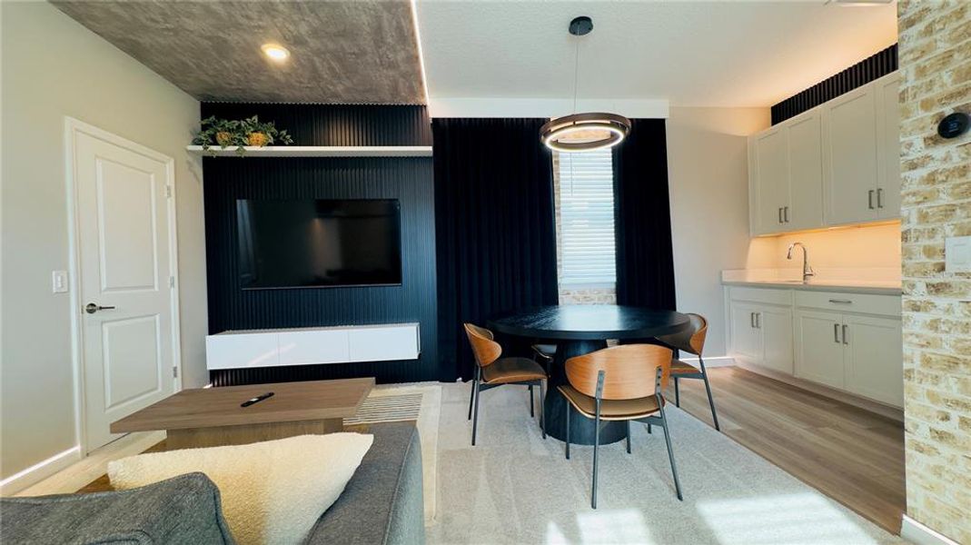 Furnished interior view inside a new home in Harvest at Ovation, Winter Garden (Image 49).