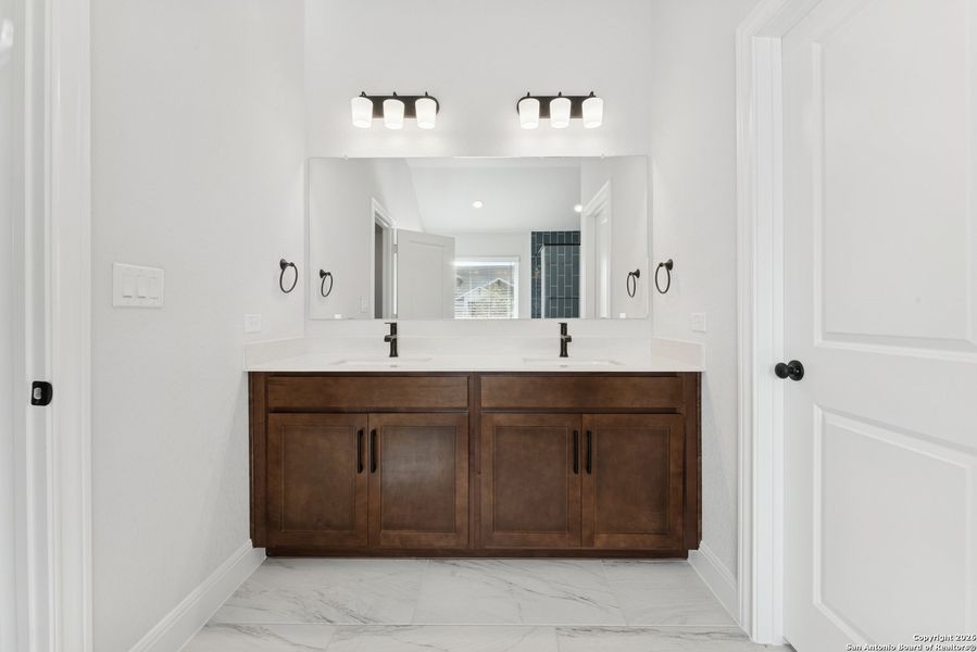 Furnished interior view inside a new home in Davis Ranch 60', San Antonio (Image 12).