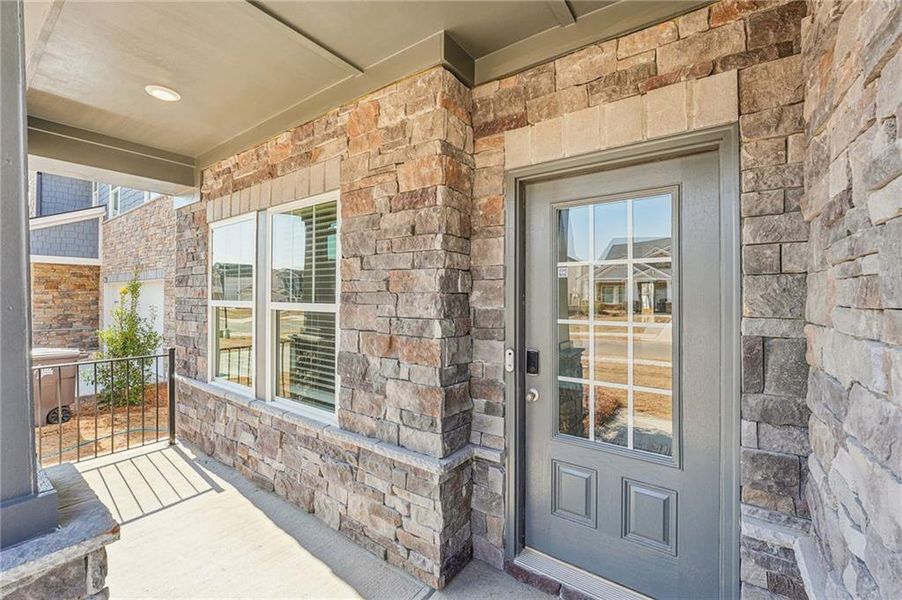 Exterior details and patio area of a home in Westmont Preserve, Powder Springs (Image 3).