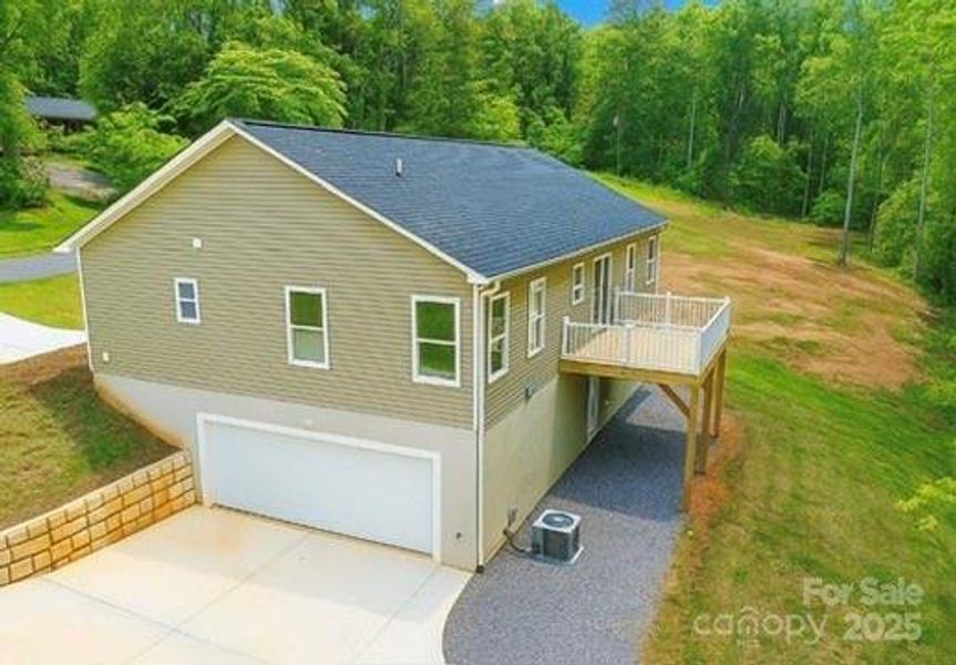 Front exterior of a new home in , Rutherfordton, NC, highlighting curb appeal (Image 15).