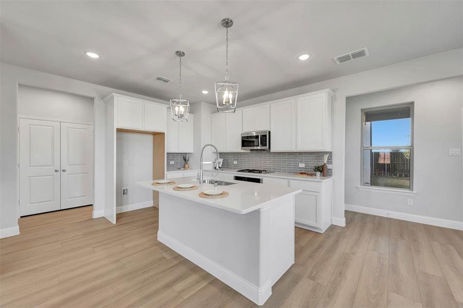 Furnished interior view inside a new home in Lilybrooke at Legacy Hills, Celina (Image 9).
