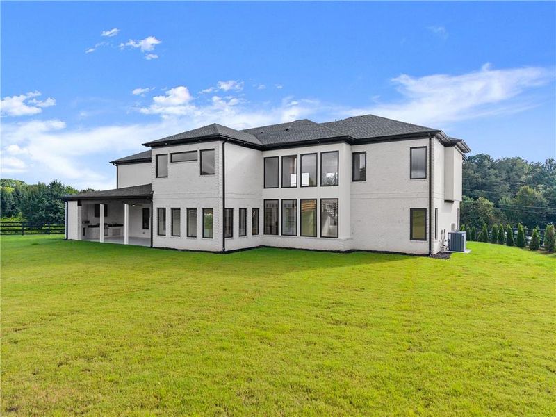 Front exterior of a new home in , Dacula, GA, highlighting curb appeal (Image 24).