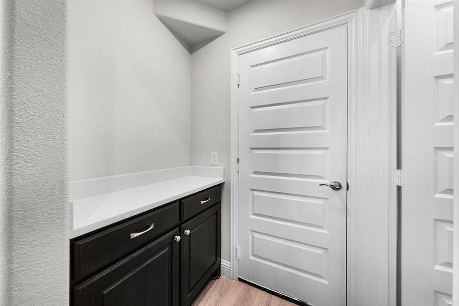 Butlers pantry off of kitchen can be used for extra storage, coffee bar or wet bar. Butlers pantry off of kitchen can be used for extra storage, coffee bar or wet bar.