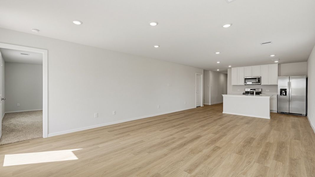 Spacious, unfurnished interior of a new home in Sunterra, Katy (Image 16).