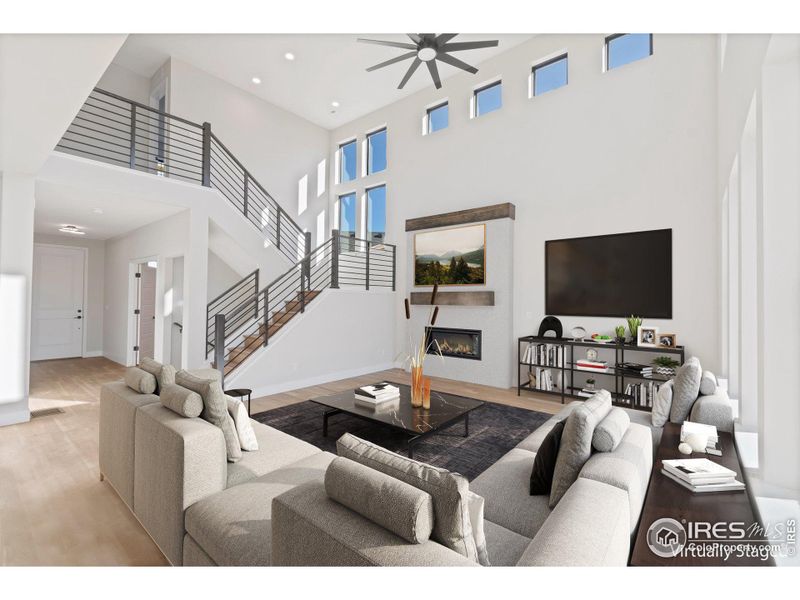 Open Concept Family Room w/ Gas Fireplace and Vaulted Ceiling